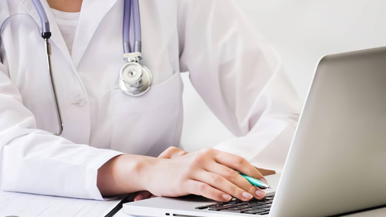 Home health worker reviewing patient records on a tablet