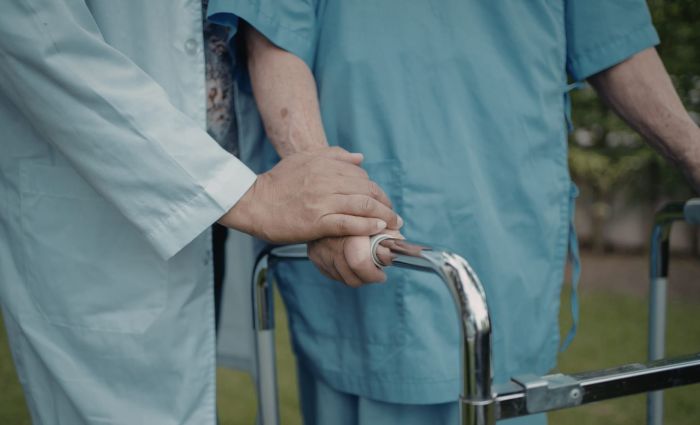 elderly person with caregiver